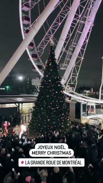 La Grande Roue holiday crowd event beneath the wheel